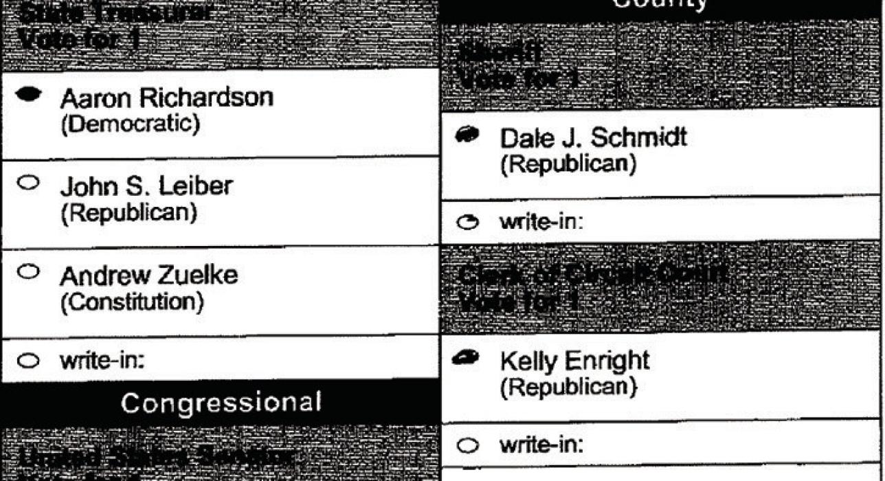 On this ballot, the voter made an inadvertent mark on an oval, which the machine read as a vote. Again, this was thrown out as an over vote. A hand count would have caught the error and interpreted the ballot correctly.
