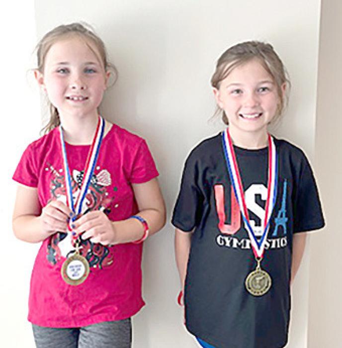 Winners of the Girls 5K 10U were Taylynne Hay, left, and Oaklynn Baker, right.