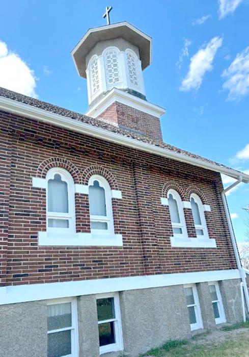 The Gregory County Historical Museum, formerly St. Augustine Catholic Church, in Dallas, recently underwent a complete exterior renovation including tuckpointing on the brickwork and fresh paint on the wood surfaces.