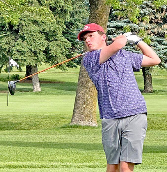 Jacob Klein tees off at the state meet. He scored a 173 over the two days. (Photo by Sara Anderson)
