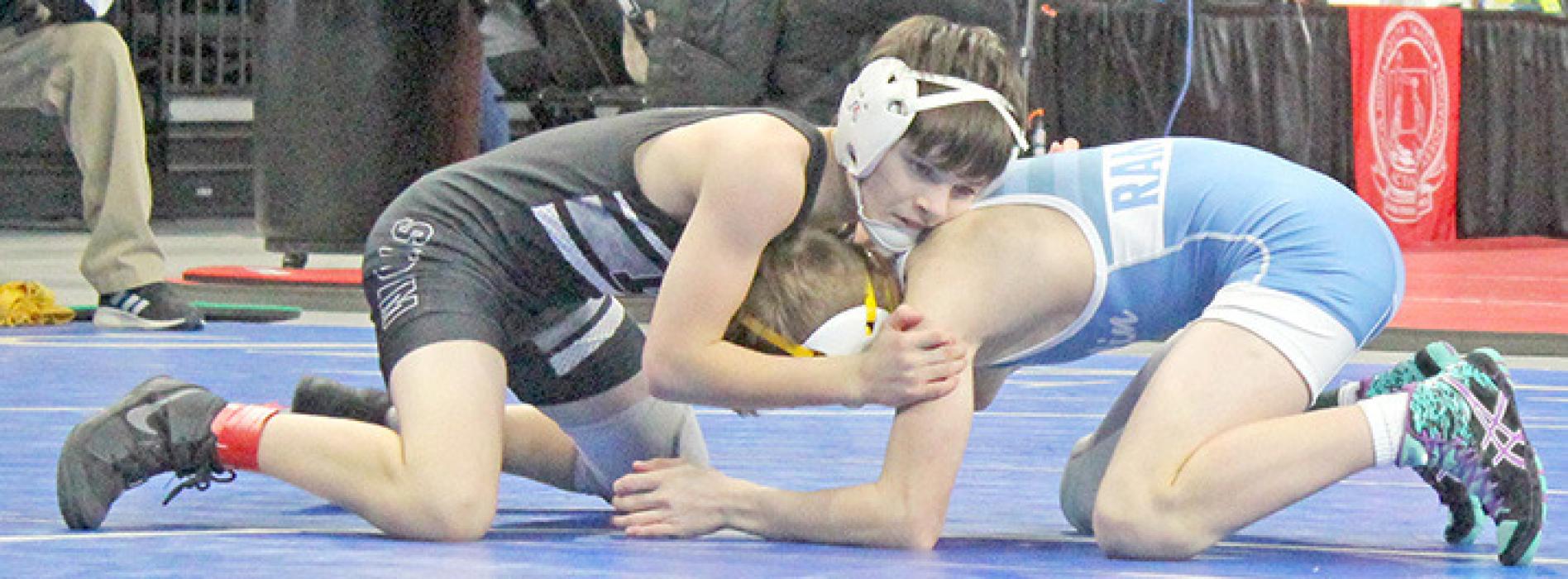 Judd Hansen had two very close matches at the state tournament, only losing the last after three tie-breakers. (Photo by Gracie Stephens)