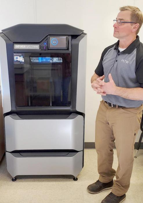The engineering class, taught by Mike Murray, uses the 3-D printer to bring their inventions to life.