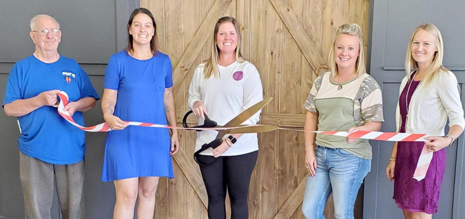 A ribbon cutting for SoDak Sun Yoga was held last Wednesday. Participating Chamber members are shown, l to r: Darold Frasch, Chamber Director Suzanne Braun, SoDak Sun Yoga owner Lacey Collins, Whitney Fenton, and Dannielle Miller.