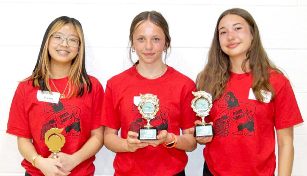 The 7th graders received 3rd place: Vivian Nguyen, Abigail Holmes and Kennley Sedlacek.