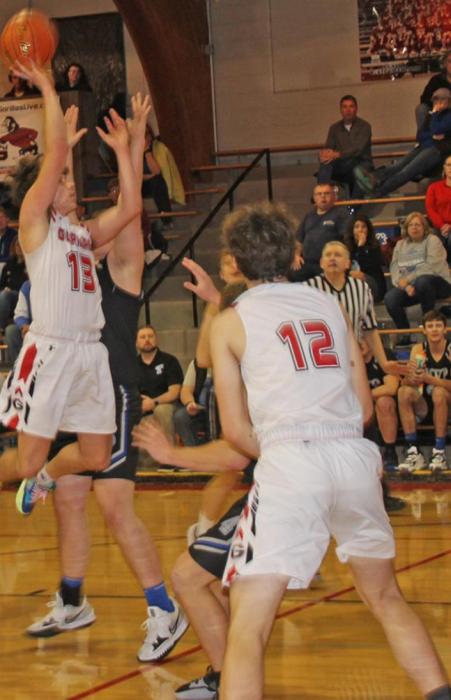 Carson Klundt goes up for a jump shot against MVP.
