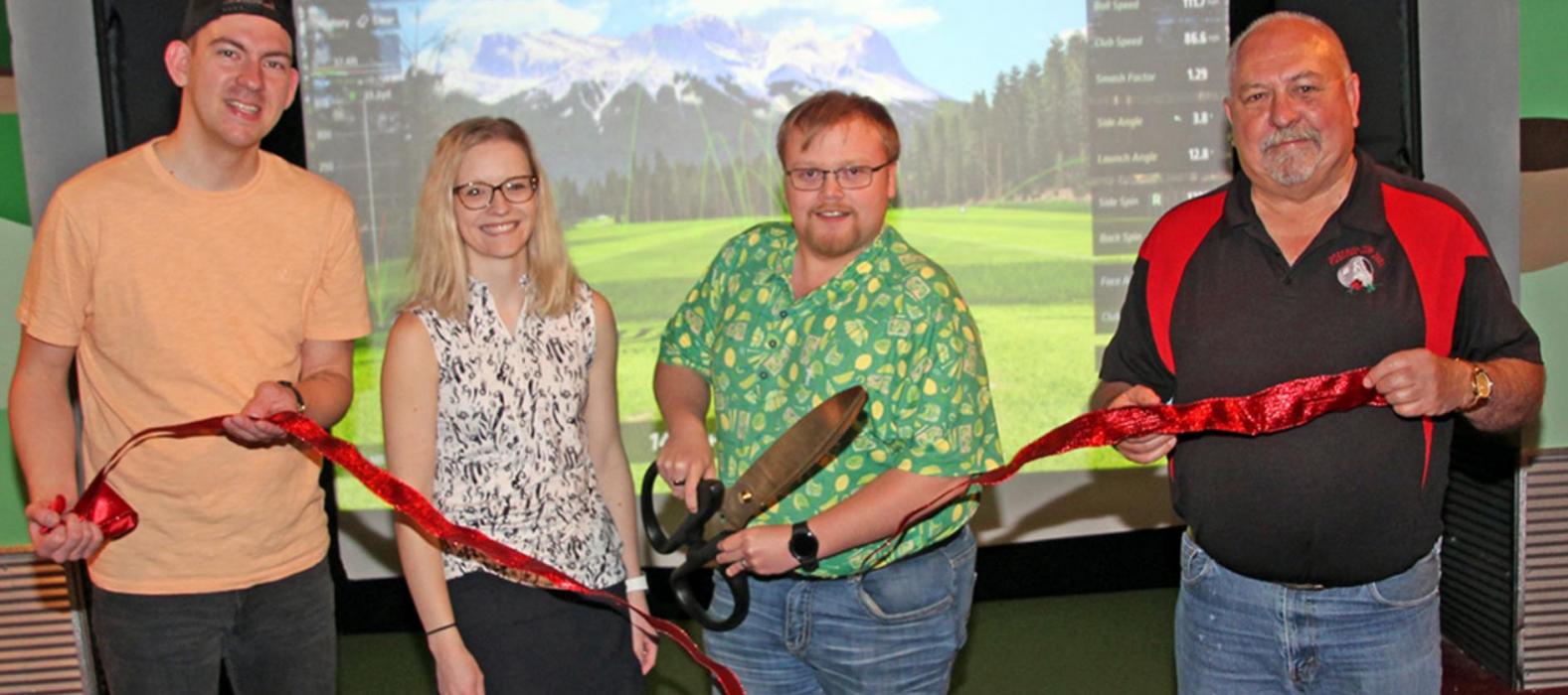 Sarah and Aric Hamilton, center l and r, of Gregory County VR celebrated their grand opening Saturday evening, May 7, with Gregory/Dallas Chamber of Commerce Director Trenton Seegers, l, and Mayor Al Cerny, l.
