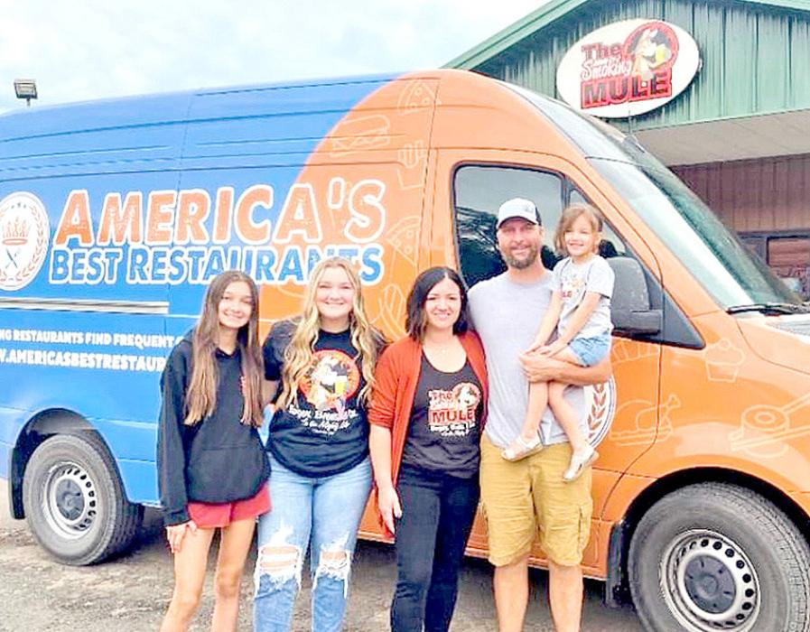 Erica Sperl created the 2025 Burger Battle winner with her step-dad Terry Gaulke. Sperl is pictured here with her family left to right: Rylie, Raegan, Erica, Ben, and Rowan. (Courtesy photo)