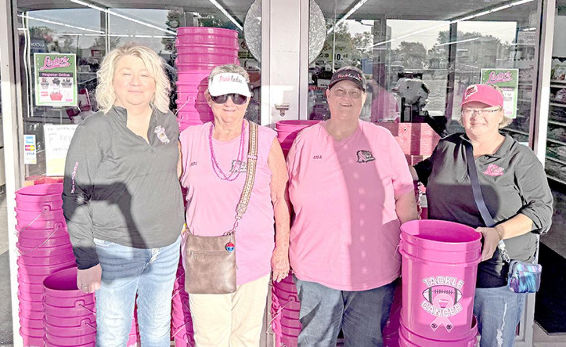 Members of the Burke Pink Ladies lend a hand during Runnings Ladies’ Night to help distribute buckets and share information about their organization were l to r; Heather Menkins, Linda Johnson, Lisa McCarthy and Kelly Tuttle. Also assisting at the event, but not pictured, were Jet Worden and Katie Lytle.