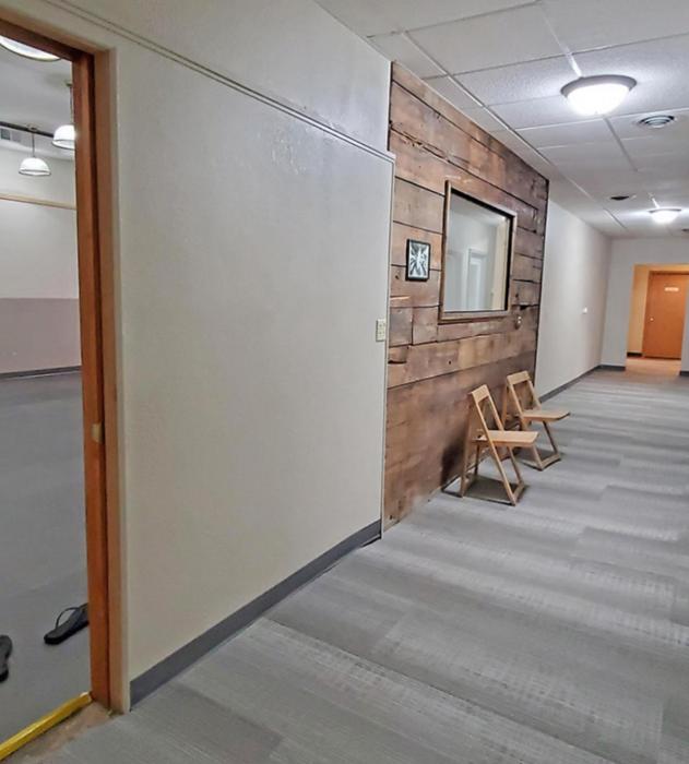Down the hallway are offices. The Gregory Learning Center has a separate testing room from their main offices here. They have a separate entrance at the back of the building.