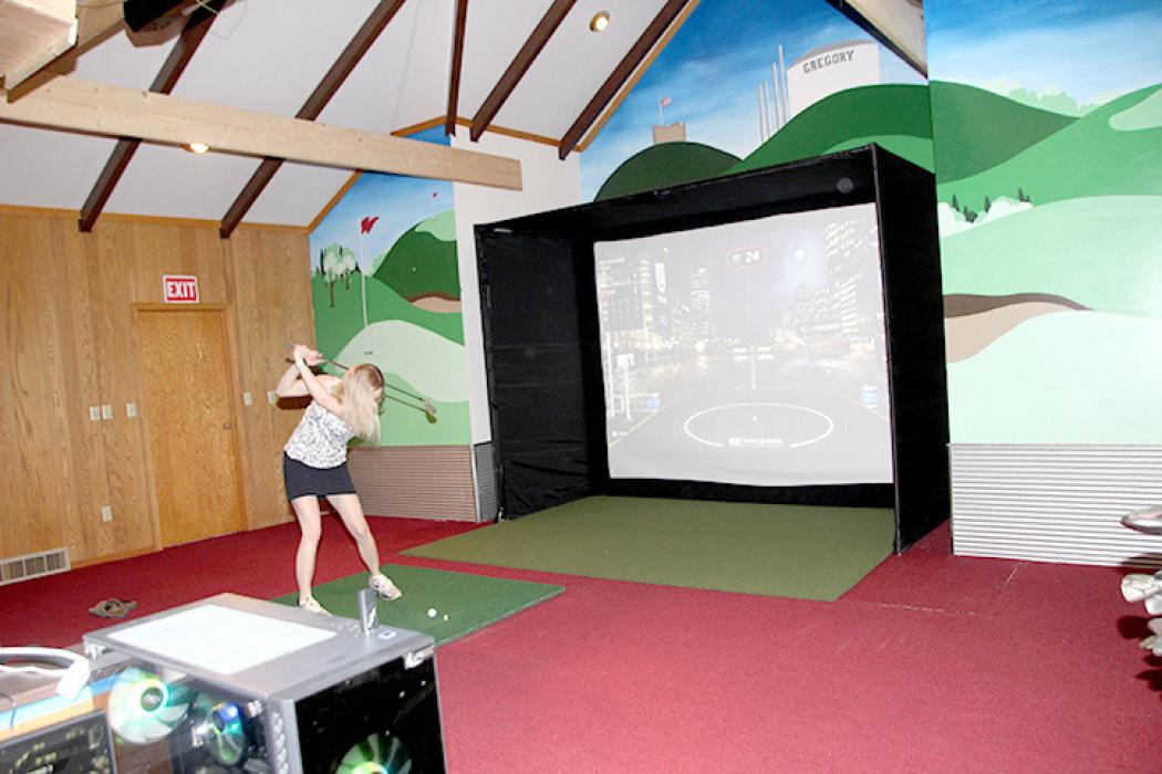 Sara and Aric Hamilton opened West River VR, a virtual golf business.