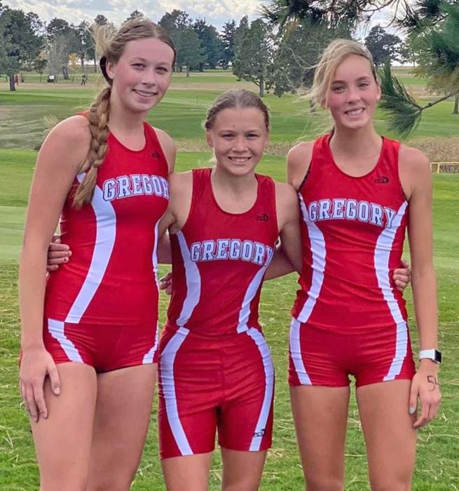 The state qualifiers for the girls team are pictured from l to r: Cassidy Keiser, Emily Grim, and Asia VanDerWerff.