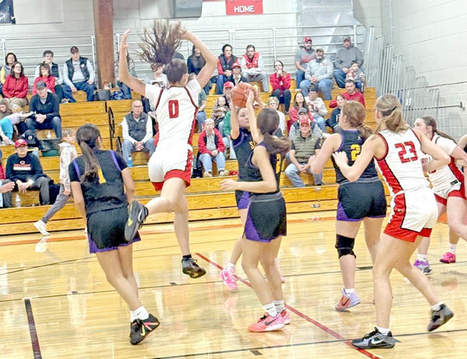 Dani VanDerWerff flies high in Gregory’s quarterfinal win agains Lower Brule at home last week. (Photo by JMe Braun)