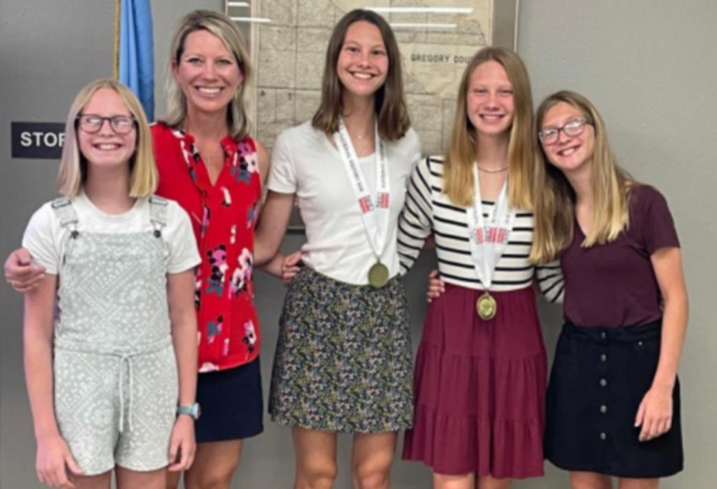 Pictured above is the Wortmann family, l to r: Meredith, 10, Holly, their mother, Elizabeth, 16, Sophia, 14, and Cecelia, 12.
