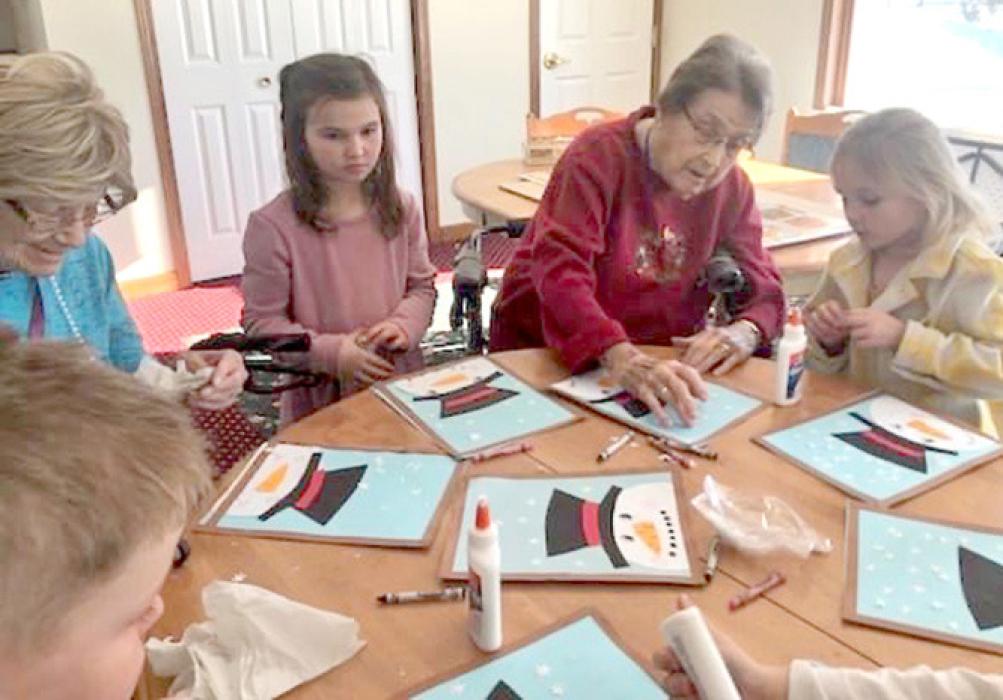 Gregory students visit Silver Threads Assisted Living for activities with residents