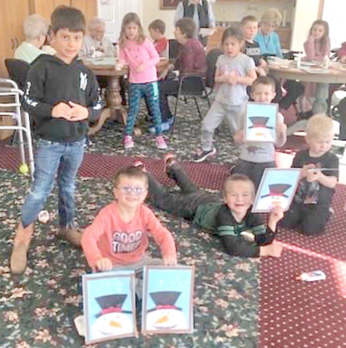 Gregory students visit Silver Threads Assisted Living for activities with residents