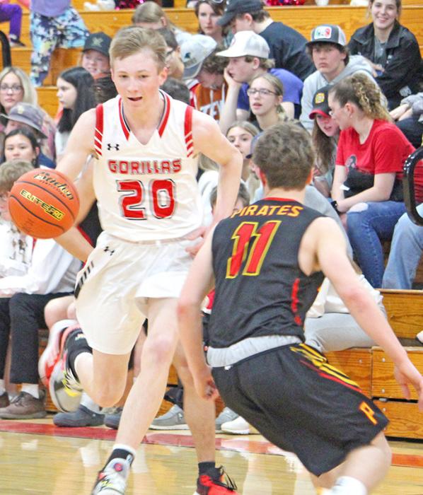 Colt Keiser makes his way around the Pirate defenders in the second round of the Region 5B tournament.