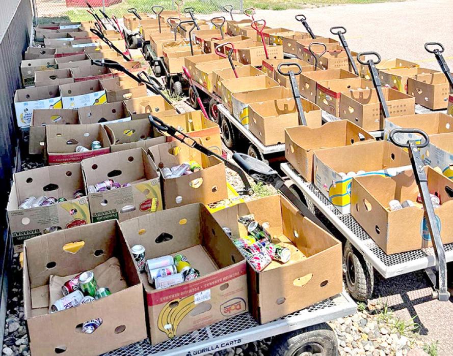 Boxes at the Faith Temple Food Giveaway in Sioux Falls, SD, on June 27, 2025, to be loaded into cars. (Photo: Emily DeCock / South Dakota News Watch)