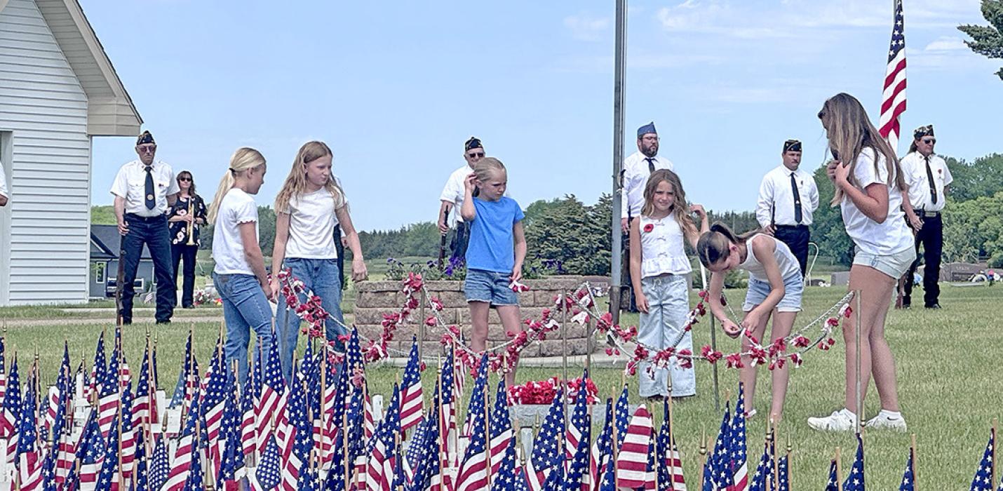 Jr. Auxiliary girls honored the Tomb of the Unknown Soldier at the Gregory IOOF Cemetery.