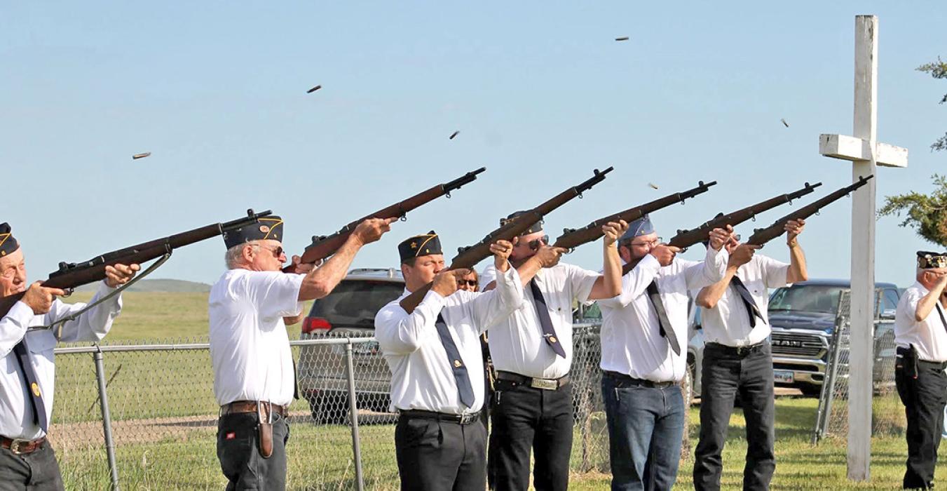 Honor Guard shown firing the 21-gun salute at the Dixon Cemetery. (Jenifer Hoeft)