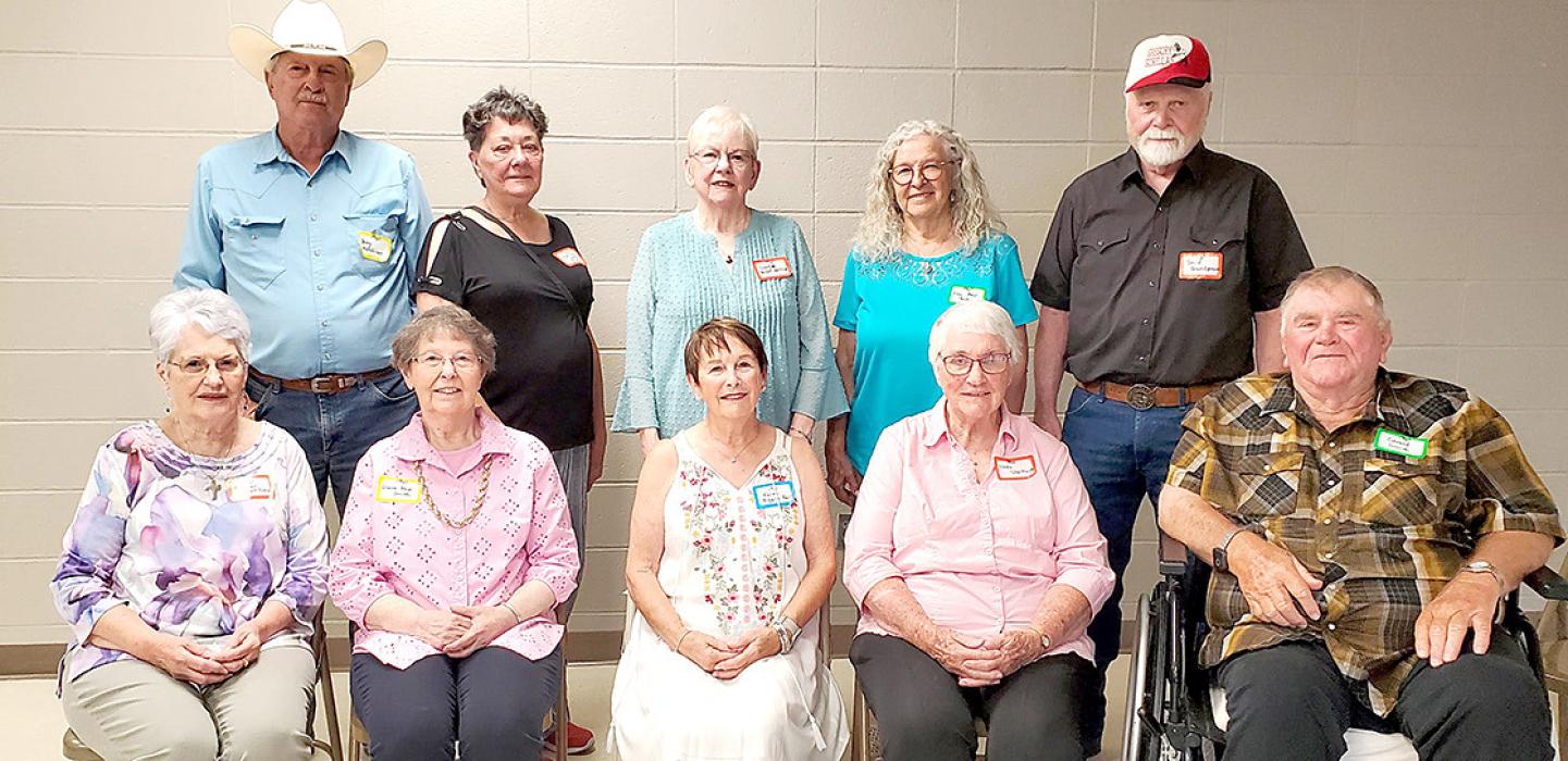 Members of the class of 1961 are back row, l to r: Jerry Hutchison, Kathleen (Lane) Eide, Georgie Haffield, Kay Bess Andera, and David Grundstrom. Front row, l to r: Kathleen (Shattuck) Polansky, Diane (Beck) Smith, Karen (Biggins) Karl, Linda (Shattuck) Leber, and Gerald Smith. 