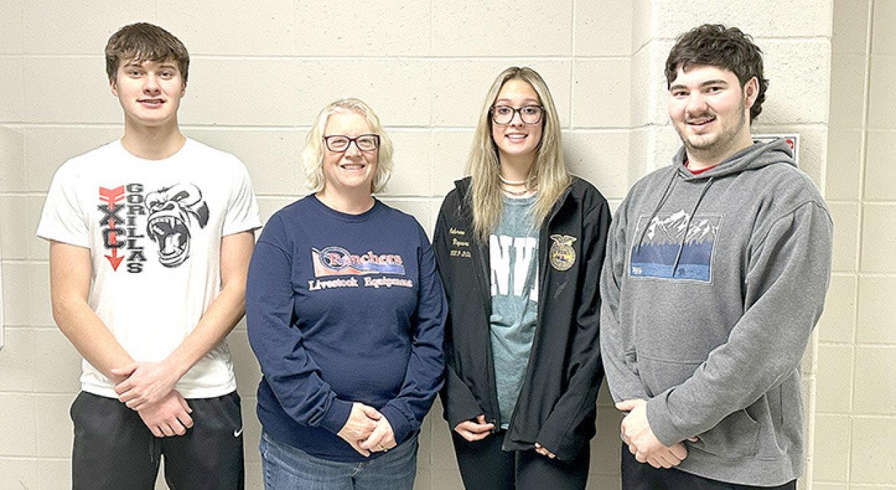 Representing the FFA Chapter from Gregory were, l to r: Nick Kenzy, officer, Laura Petersen, owner of Ranchers Livestock Equipment, Aubree Miller, officer, and Jamison VanderPol, officer.