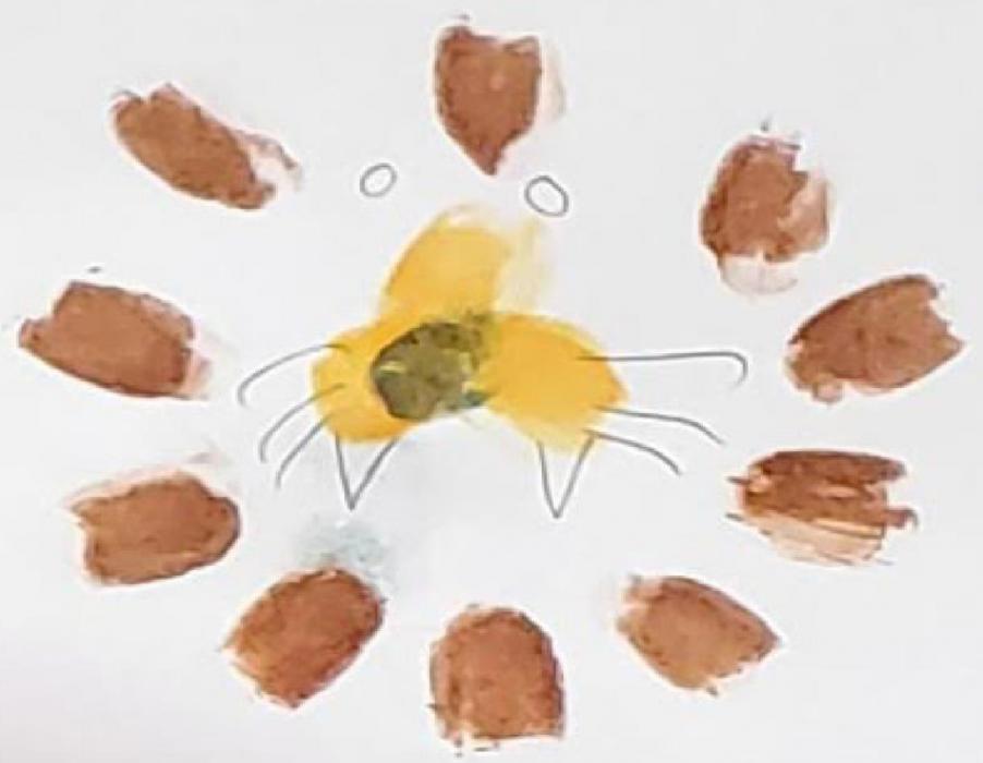 Lions, cats, dogs, birds, people, flowers, trees, and spiders were just a sample of what the students created with their fingerprints.