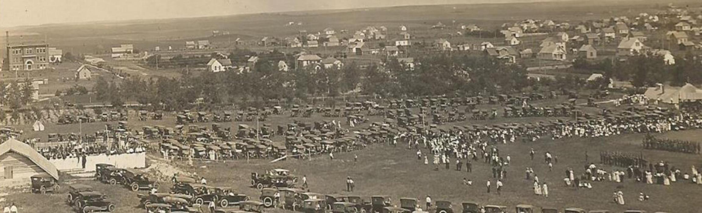 A crowded pool is shown in the bottom left corner, next to the ice house, during a July 4th baseball game in 1918 (not pictured).