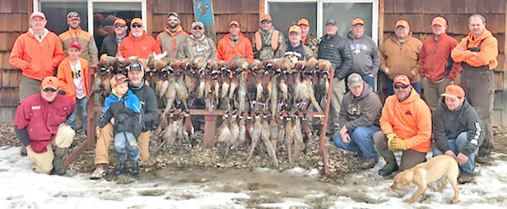 Participants from the 2015 Benefit hunt pose with their birds. (Submitted photo)