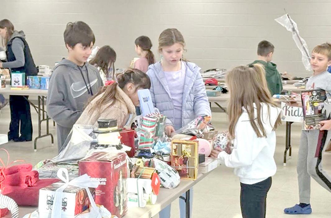 Elementary students shop ‘til they—or the volunteers—drop