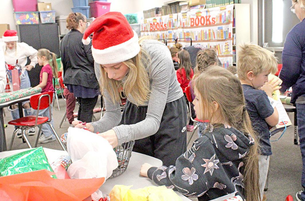 Elementary students shop ‘til they—or the volunteers—drop