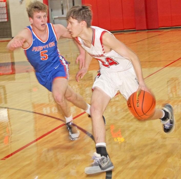 Nick Kenzy stays ahead of a Parkston defender in Gregory’s narrow win against the Trojans.