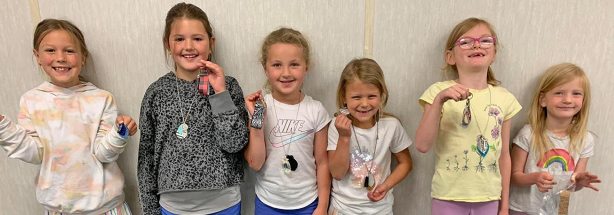 Participants make their our jewelry during 4-H workshop held last week of May