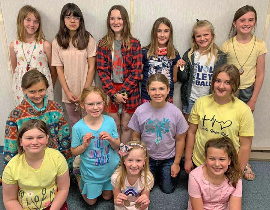 Participants make their our jewelry during 4-H workshop held last week of May