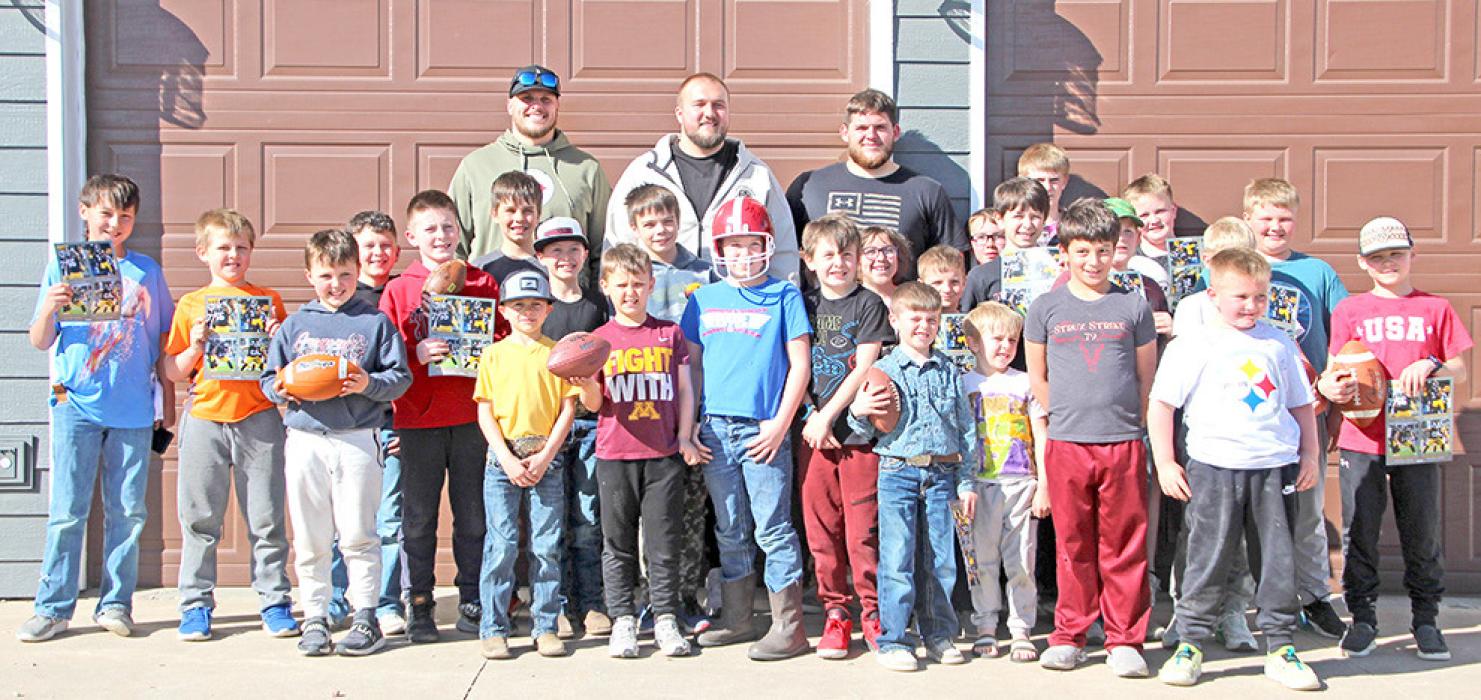 Three Pittsburgh Steelers football players spent time with local youth, signing autographs and posing for pictures, after the benefit hunt.