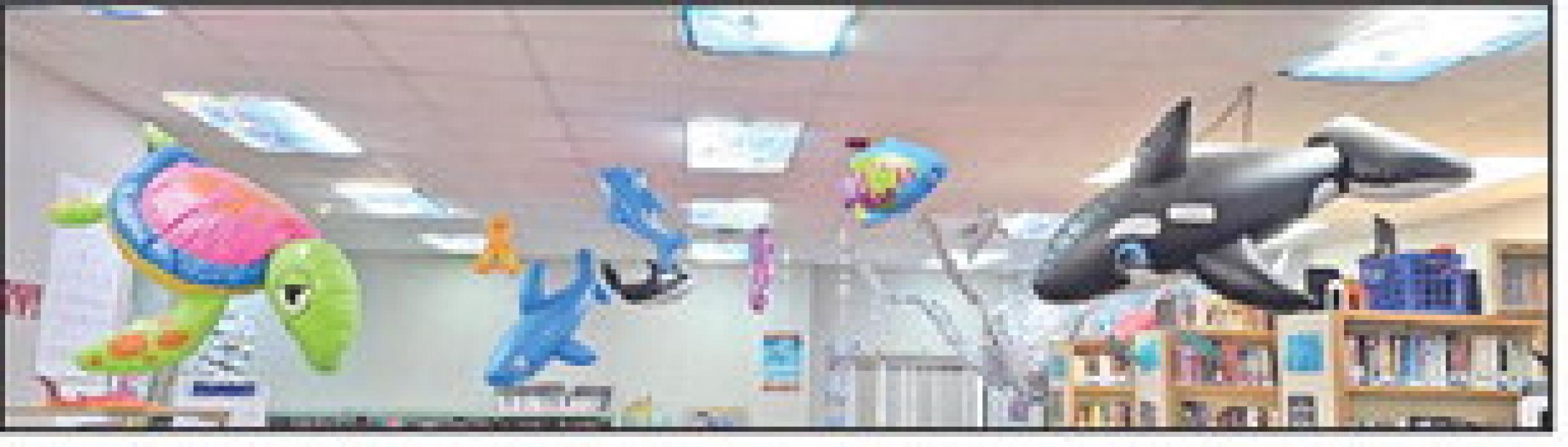 Students at Gregory Elementary School have been studying the sea world. Librarian Holly Whitney constructed a giant octopus that lurks over one corner of the library, while several other ocean-dwellers swim overhead. This is part of the library’s emphasis on STEAM activities.