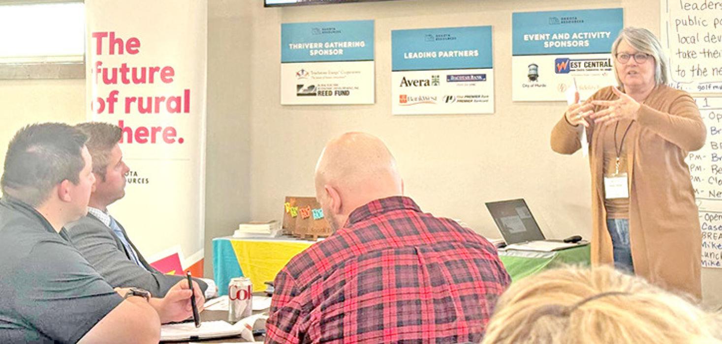 Dakota Resources community coach Paula Jensen, right, speaks to local economic development leaders who attended an idea-sharing meeting in Murdo, S.D., on Nov. 12, 2025. (Photo: Bart Pfankuch / South Dakota News Watch)