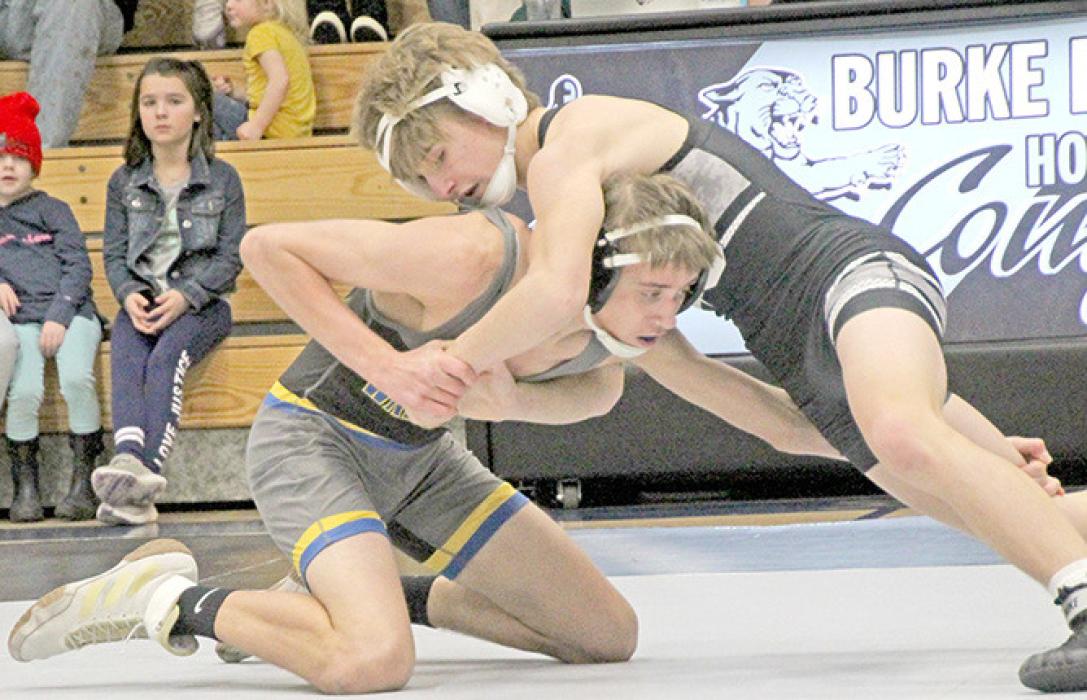 Taos Weborg earned six team points with a fall and a major decision in Ainsworth. (Photo by Gracie Stephens)