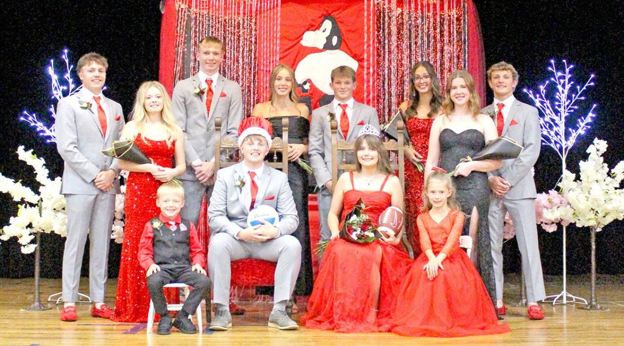The full 2025 Homecoming court is, back row, l to r: Pierce Stukel, Aubree Opp, Colt Keiser, Asia VanDerWerff, Mason Janak, Aubree Opp, Dani Timanus, and Eli Ekroth; front row, l to r: Page Miles Zimbelmann, King Bo Brozik, Queen Piper Bartlett, and Page Ellie Sedlacek. (Photo by Kristy Ring)